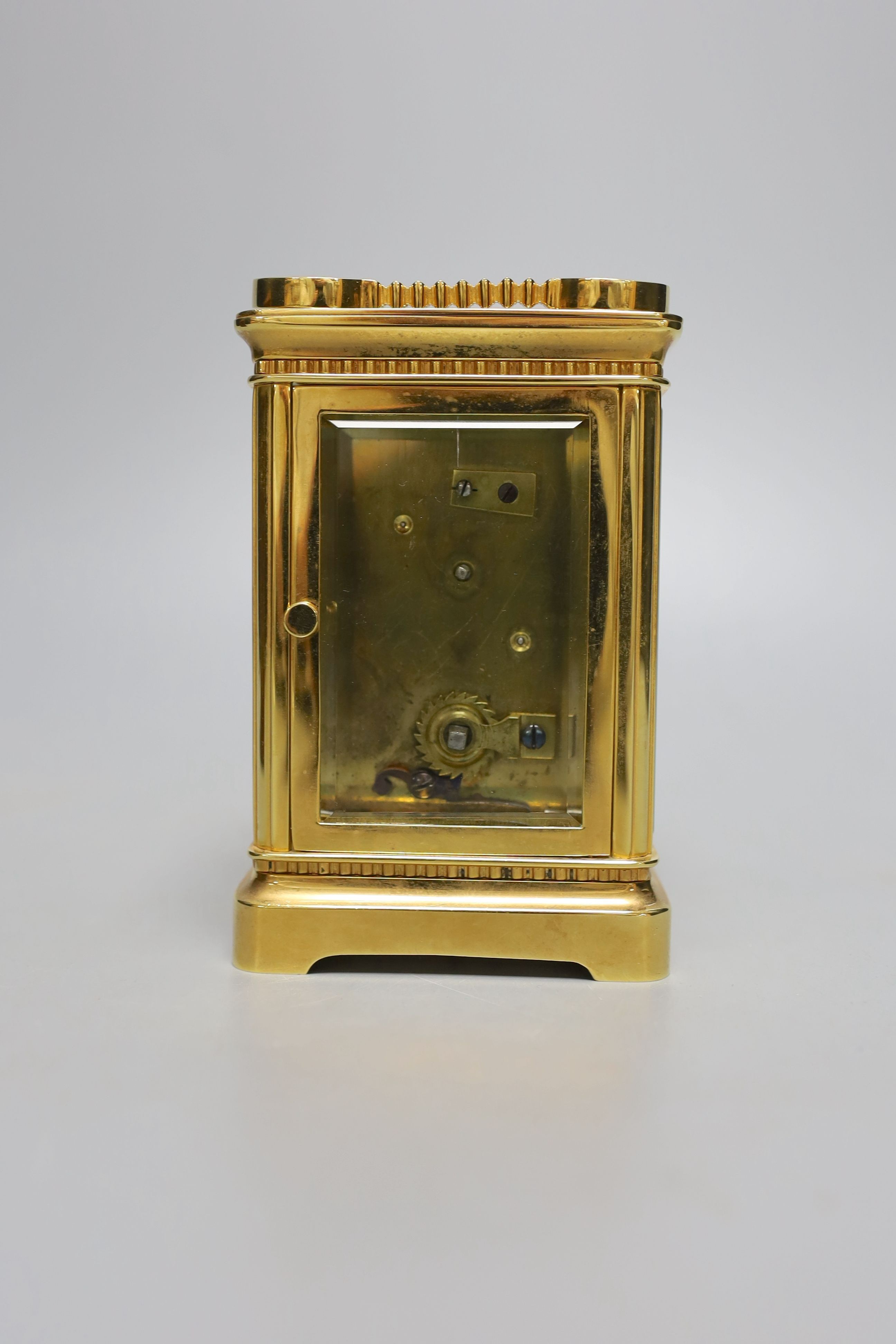 A cased French gilt brass carriage timepiece with flower garland enamelled Arabic numeral dial, c.1900 - 13.5cm tall